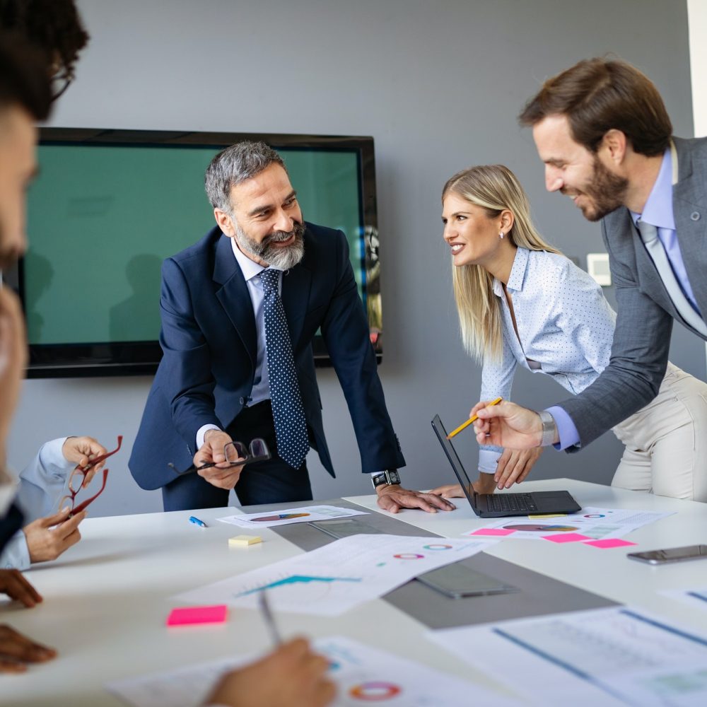 business-colleagues-working-in-modern-conference-room.jpg