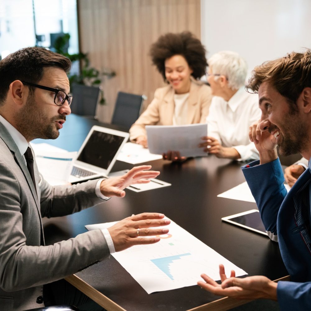 portrait-of-successful-business-team-working-in-office-2.jpg